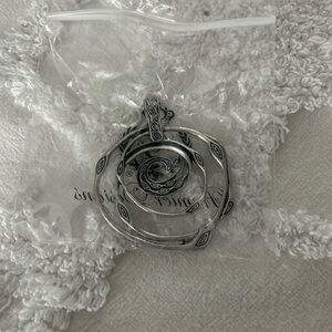 Removal necklace pendant